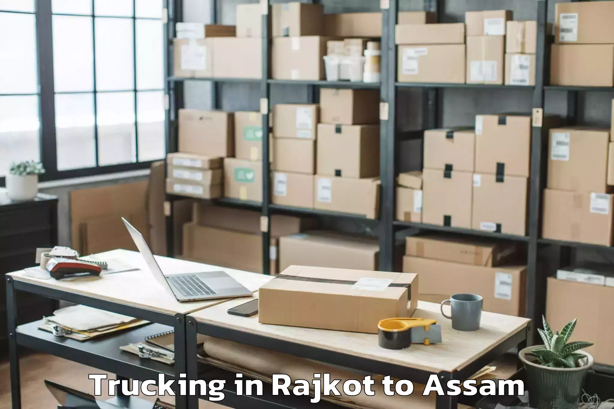 Reliable Rajkot to Bilasipara Trucking